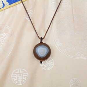 pendentif dzi œil de shiva. Bijou ethnique tibétain. Boutique zen himalayan-eshop