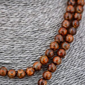 Collier chung dzi Mala japamala chapelet ou rosaire bouddhiste artisanat ethnique de l'Himalaya Tibet Chine