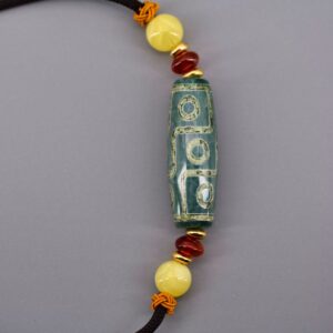 Pendentif chung dzi artisanat ethnique Tibet Chine