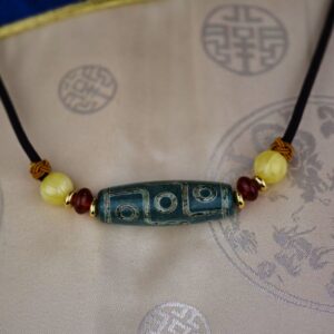 Pendentif chung dzi artisanat ethnique Tibet Chine