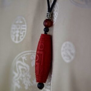 Pendentif artisanat ethnique agate cinabre chung dzi de l'Himalaya Tibet Chine