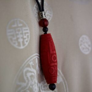 Pendentif artisanat ethnique agate cinabre chung dzi de l'Himalaya Tibet Chine