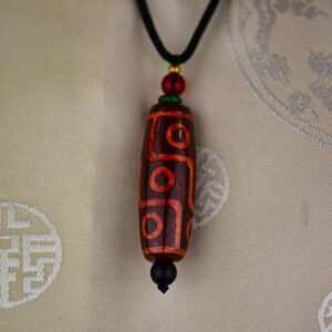 Pendentif agate chung dzi artisanat ethnique de l'Himalaya Tibet Chine