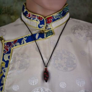 Pendentif chung dzi artisanat ethnique de l'Himalaya Tibet Chine