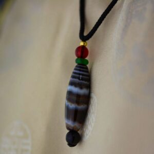 Pendentif chung dzi Artisanat ethnique de l'Himalaya Tibet Chine