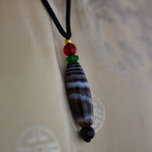 Pendentif chung dzi Artisanat ethnique de l'Himalaya Tibet Chine