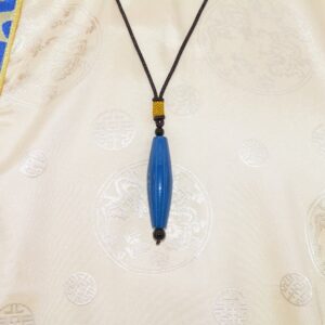 Pendentif tibétain en agate bleue chung dzi talisman amulette ethnique artisanat tibetain de l'Himalaya Tibet