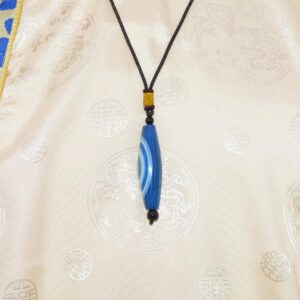Pendentif tibétain en agate bleue chung dzi talisman amulette ethnique artisanat tibetain de l'Himalaya Tibet