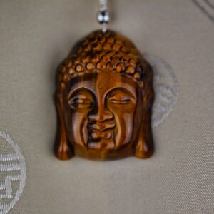 Bouddha en Œil de Tigre | Pendentif artisanal népalais | Protection & spiritualité.