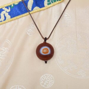 pendentif dzi œil de Shiva du Tibet. Boutique Zen himalayan-eshop. Artisanat ethnique